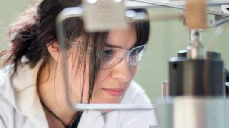 Close up of a researcher wearing safety goggles